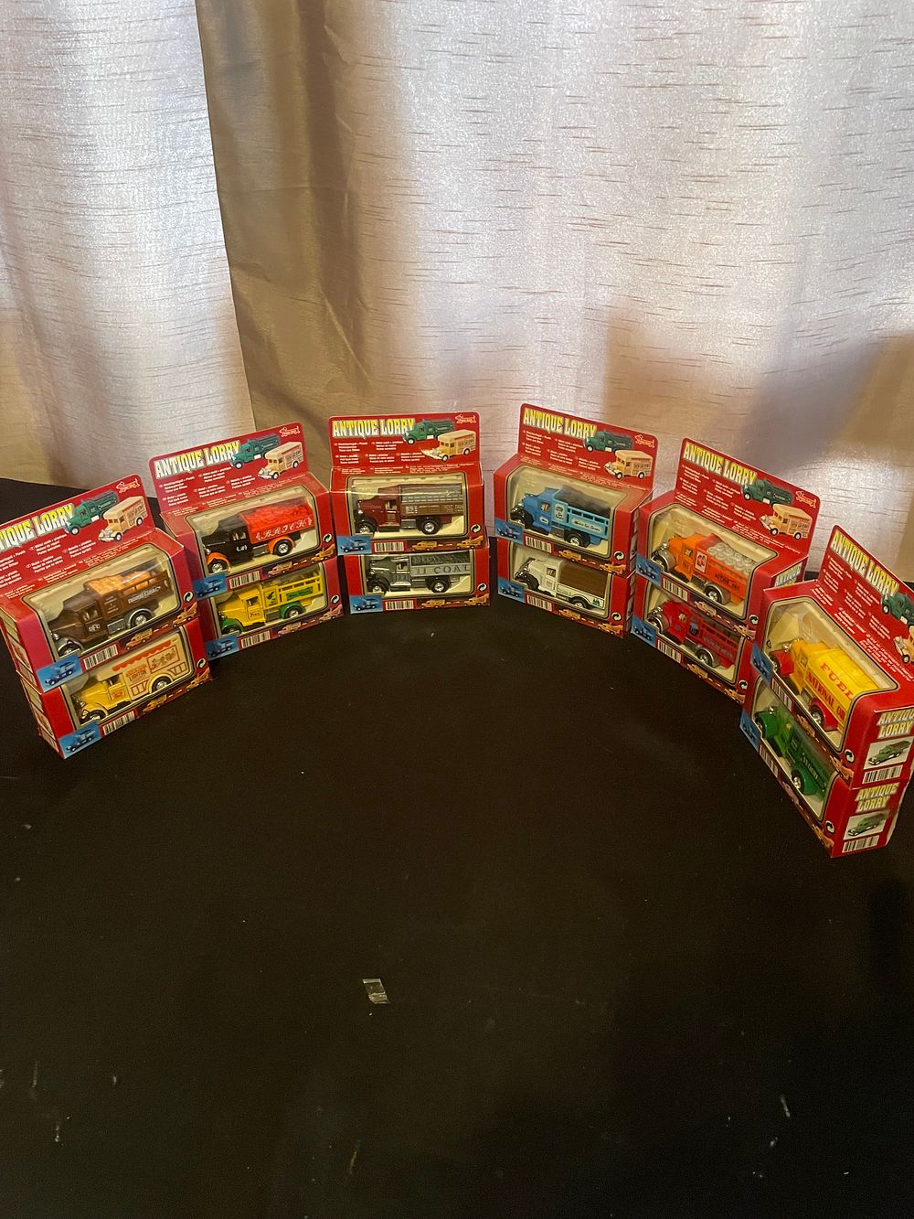 Lot 420: A Collection of Twelve Smoby 'Antique Lorry' Series Die-Cast and Plastic Miniature Trucks