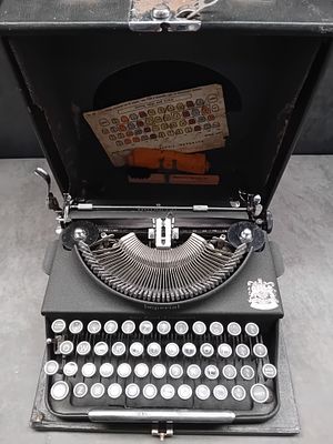 A Collection of 5 Imperial Portable Mechanical Typewriter and Accessories. A collection of five 