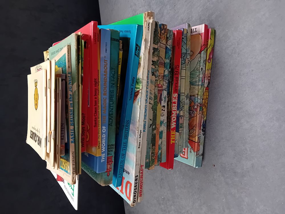 Lot 564: A Collection of 33 Vintage Children's Annuals and Books, including Rupert and Mr. Men Series