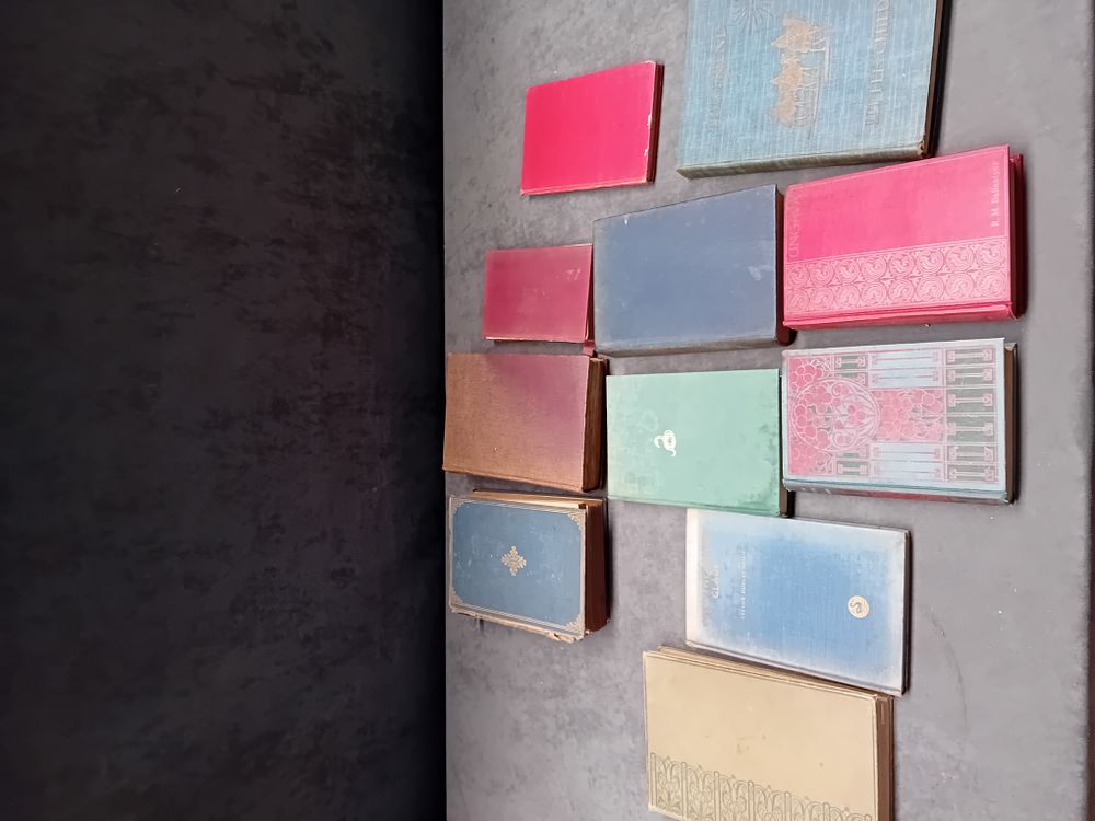 Lot 569: A Collection of 11 Vintage and Antique Cloth Bound Books