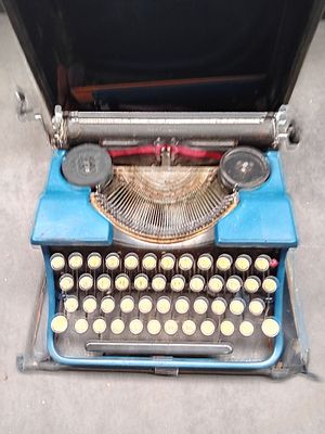 Vintage BLUE BIRD Portable Manual Typewriter. This is a vintage portable manual typewriter 