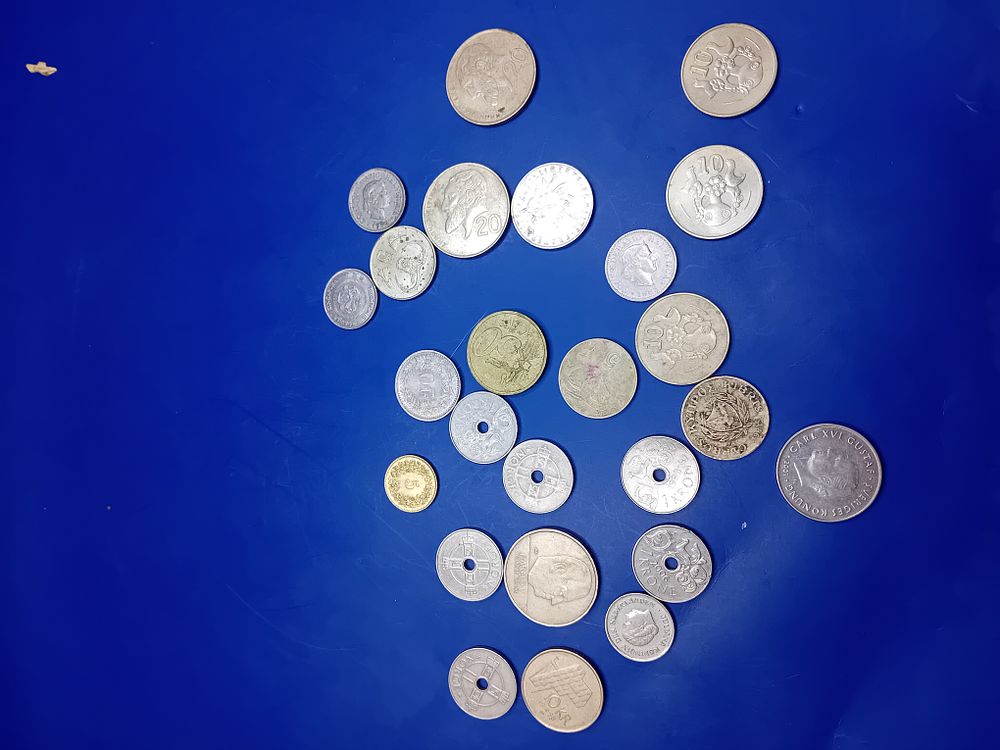Lot 666: A Collection of 23 Assorted World Coins