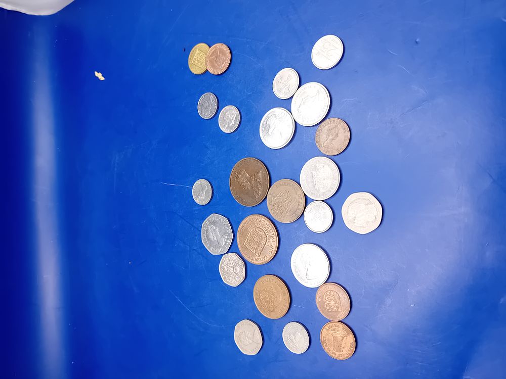 Lot 667: A Collection of 22 Assorted World and British Commonwealth Coins