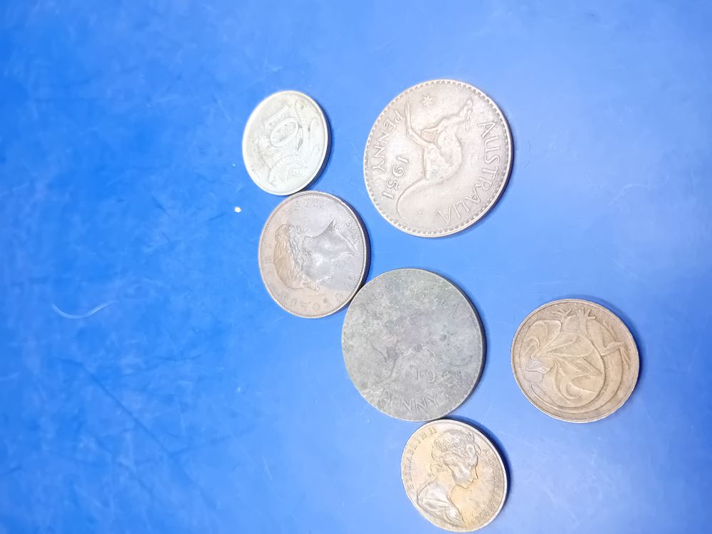 Lot 668: A Collection of 6 Australian Commonwealth Pennies and Half Pennies, George VI and Elizabeth II