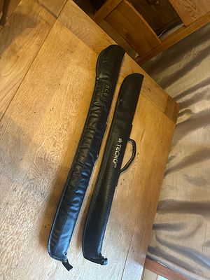 A Pair of Synthetic Leather Cue Carrying Cases by BCE and Tecno Pro. The lot consists of a pair 