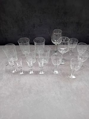 A Collection of 16 Clear Etched Glassware Pieces. A collection of sixteen pieces of clear 
