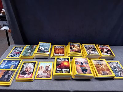 A Collection of 14 Stacks of National Geographic Magazines, Late 1990s-Early 2000s. A collection 