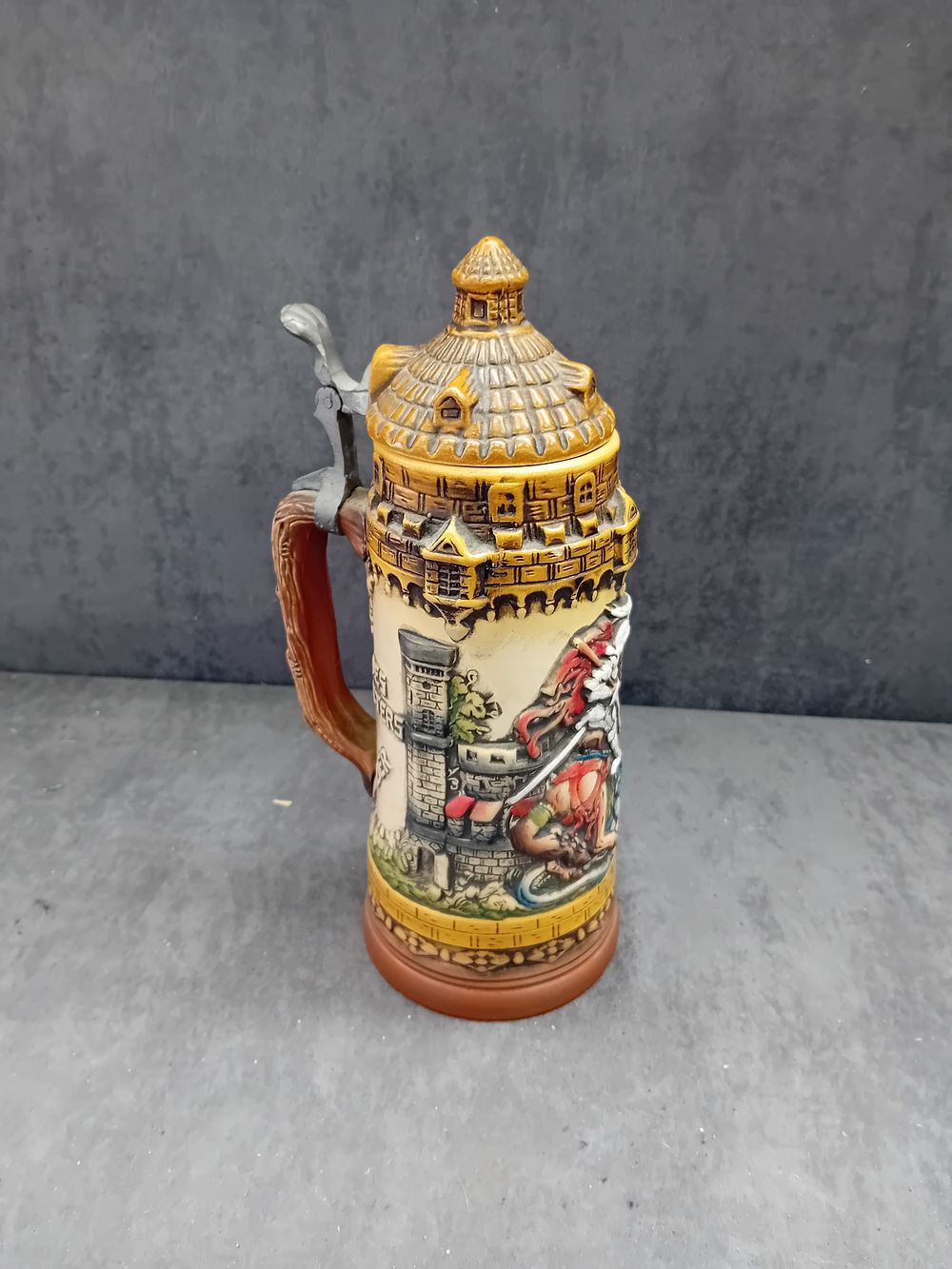 Lot 176: Original King Austria Ceramic Beer Stein, 'Kamp und Turnier' with Dragon and Knight Relief