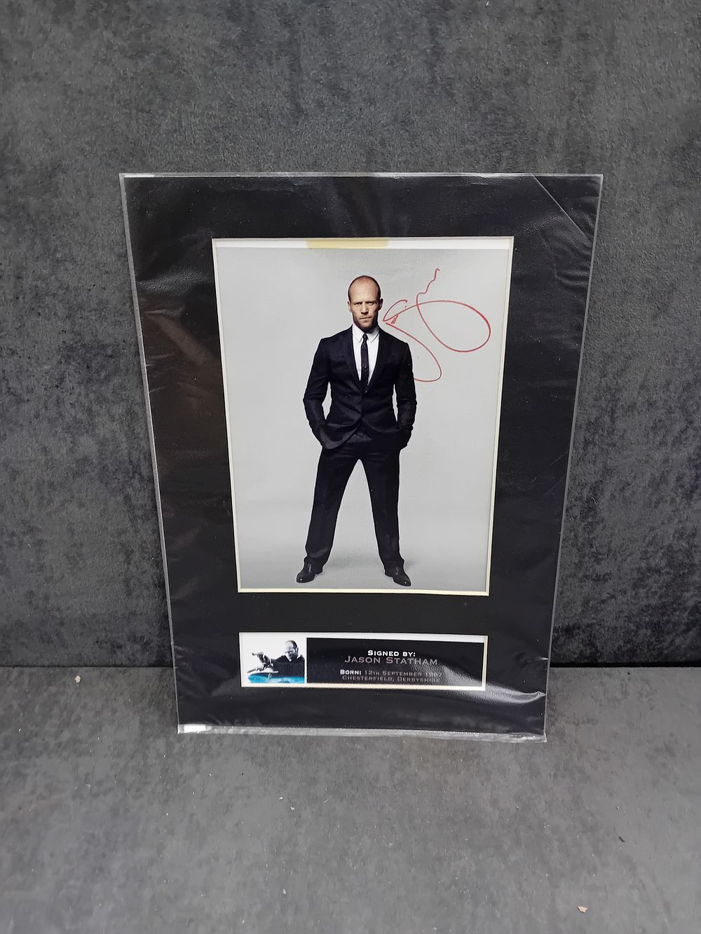 Lot 230: Jason Statham Mounted Reproduction Autograph Photo Print