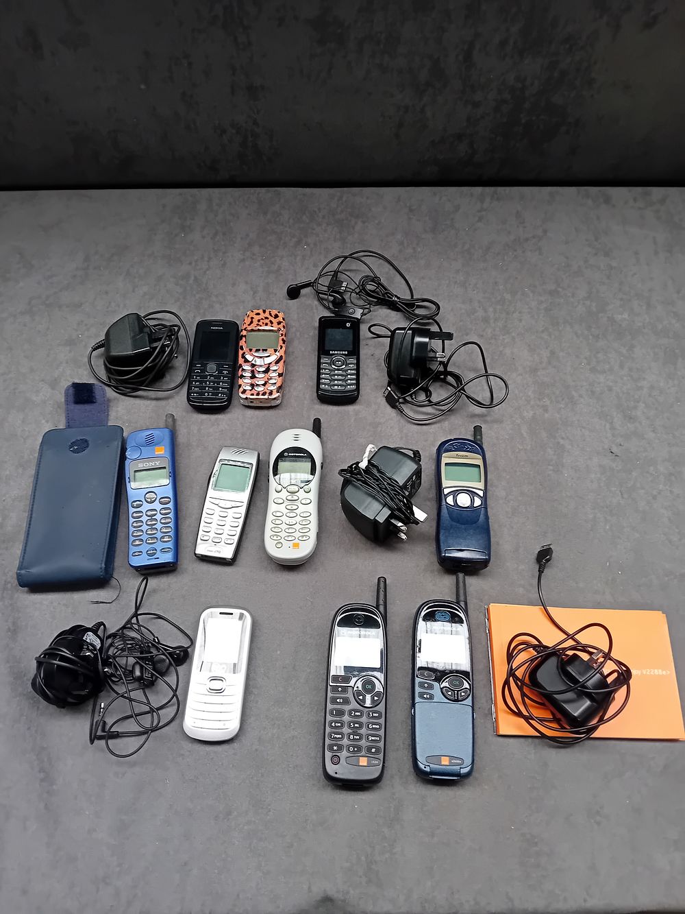 Lot 329: Large mixed lot containing 10 mobile phones as...