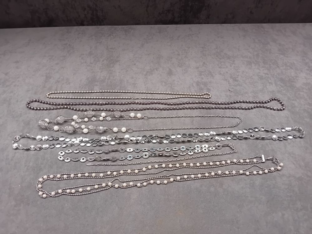 Lot 334: Mixed lot of dress Jewelry containing 6 Necklaces...