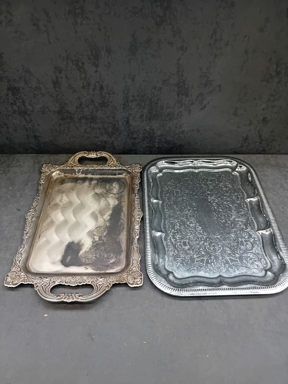 Lot 570: A Pair of Early 20th Century English Silver Plate Serving Trays