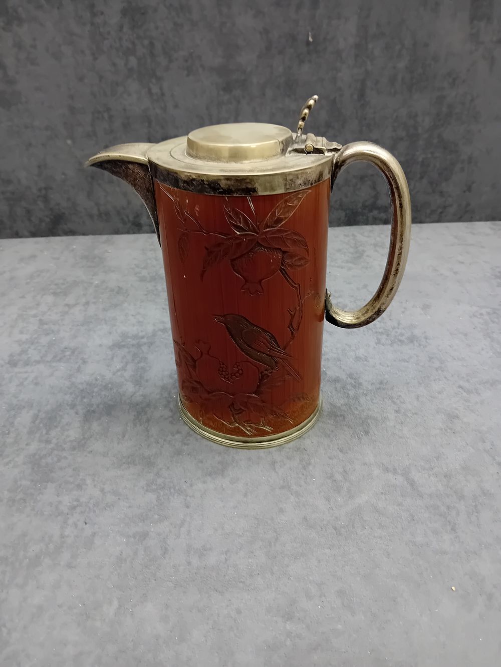 Lot 811: Antique Carved Bamboo Silver plated Jug as pictured