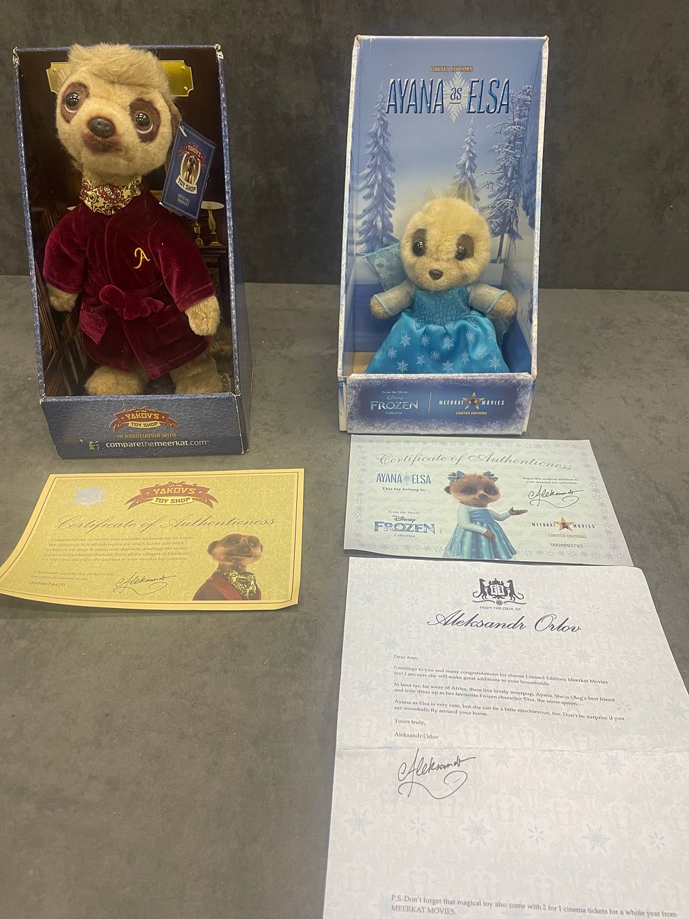 Lot 834: 2x collectibles compare the market meerkat toys containing...