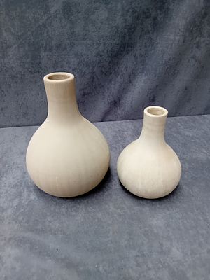 Lot of 2 Stone Vases as pictured 
Approximately 
25cm tall 
17cm tall
