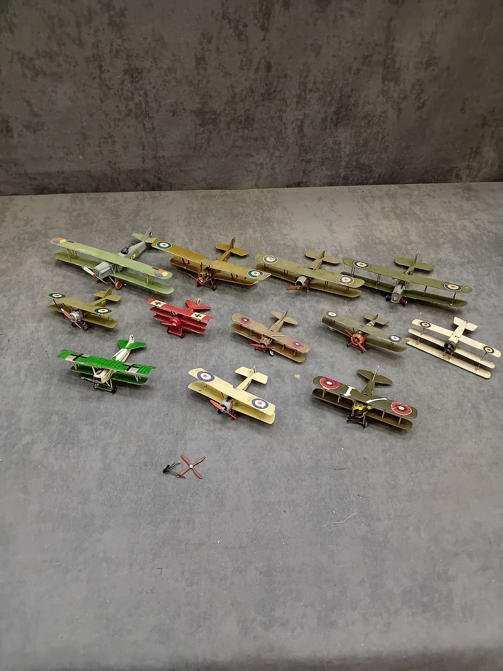 Lot 532: A Collection of World War I Era Tin-Plate and Die-Cast Miniature Model Aircraft