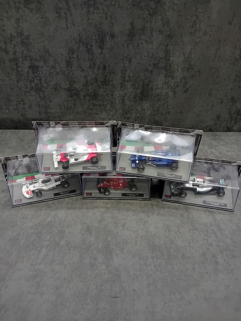 Lot 538: A Collection of Five Panini Formula 1 The Car Collection Die-Cast Model Cars, Issues 101 to 105