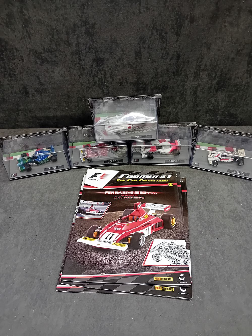 Lot 545: A Collection of 5 Panini/Centauria Formula 1 Collection 1:43 Scale Die-Cast Model Race Cars with Magazines