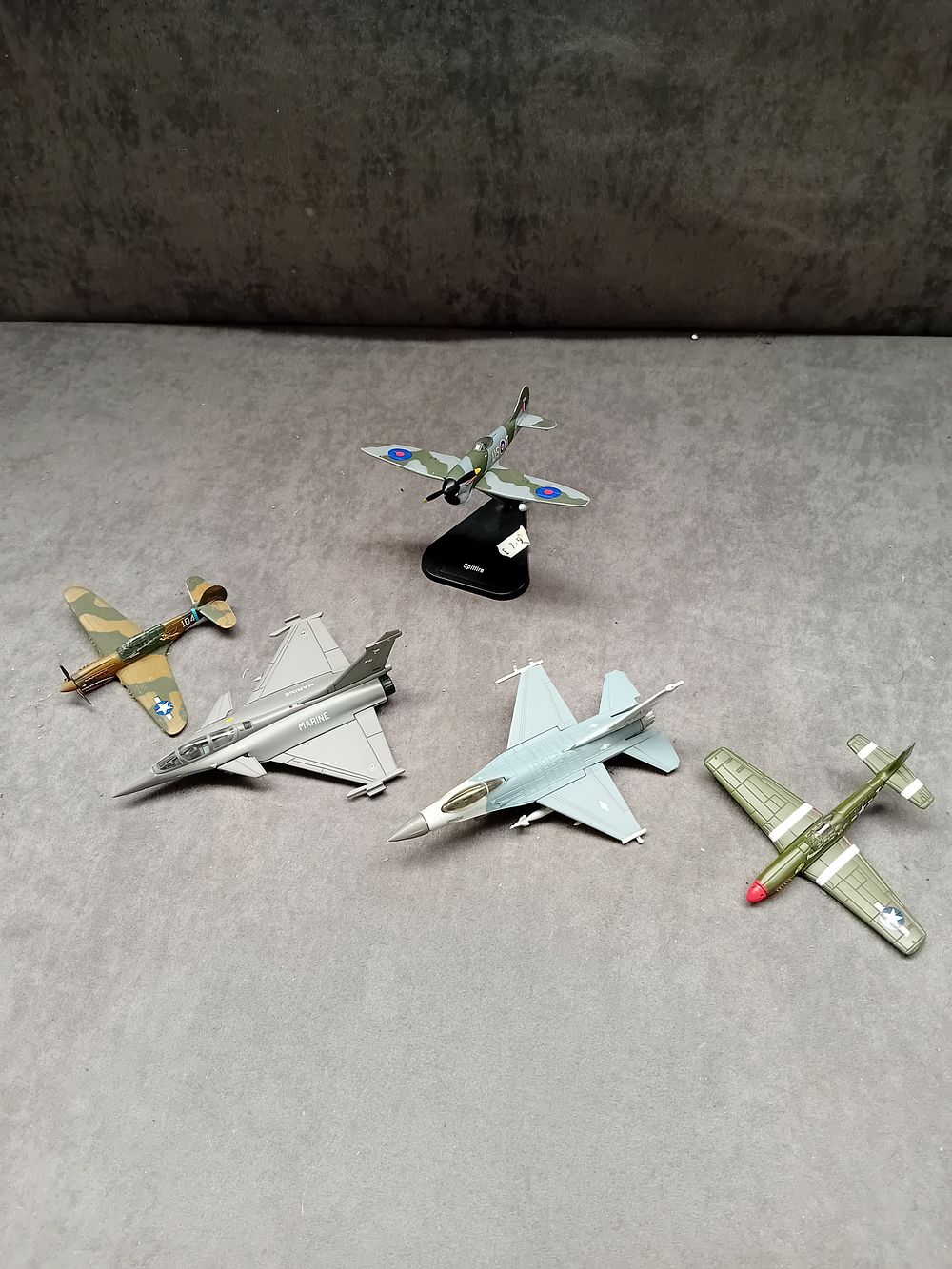 Lot 565: Lot of 5 Diecast Planes 1 on stand...