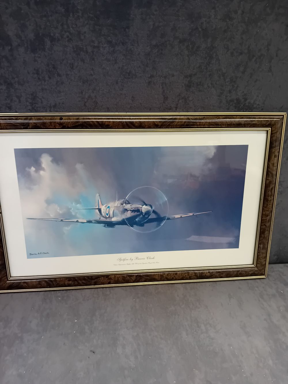 Lot 391: Barrie A.F. Clark, Framed Aviation Art Print, 'Spitfire', 67cm x 41cm