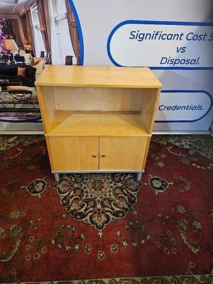 Light Wood Cabinet with Metal Frame This versatile two-door cabinet from IKEA offers a perfect 