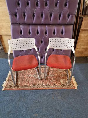 6 x Vitra Visavis arm chairs red upholstered seat pad on a stainless steel frame 53cm x 45cm x 80cm