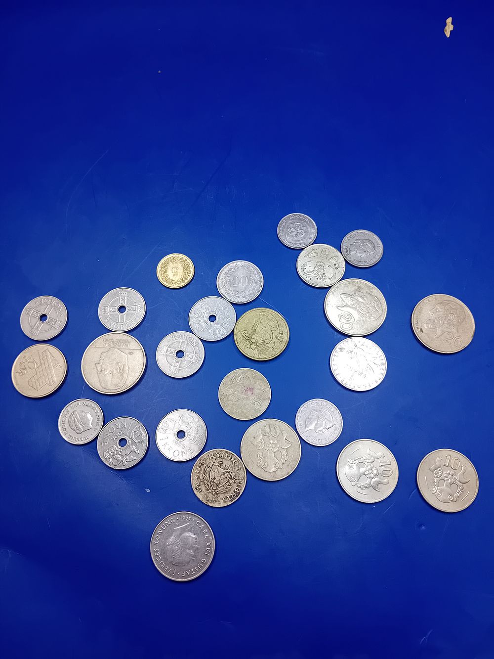 Lot 461: A Collection of 23 Assorted World Coins