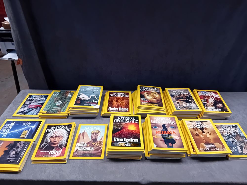 Lot 308: A Collection of 14 Stacks of National Geographic Magazines, Late 1990s-Early 2000s