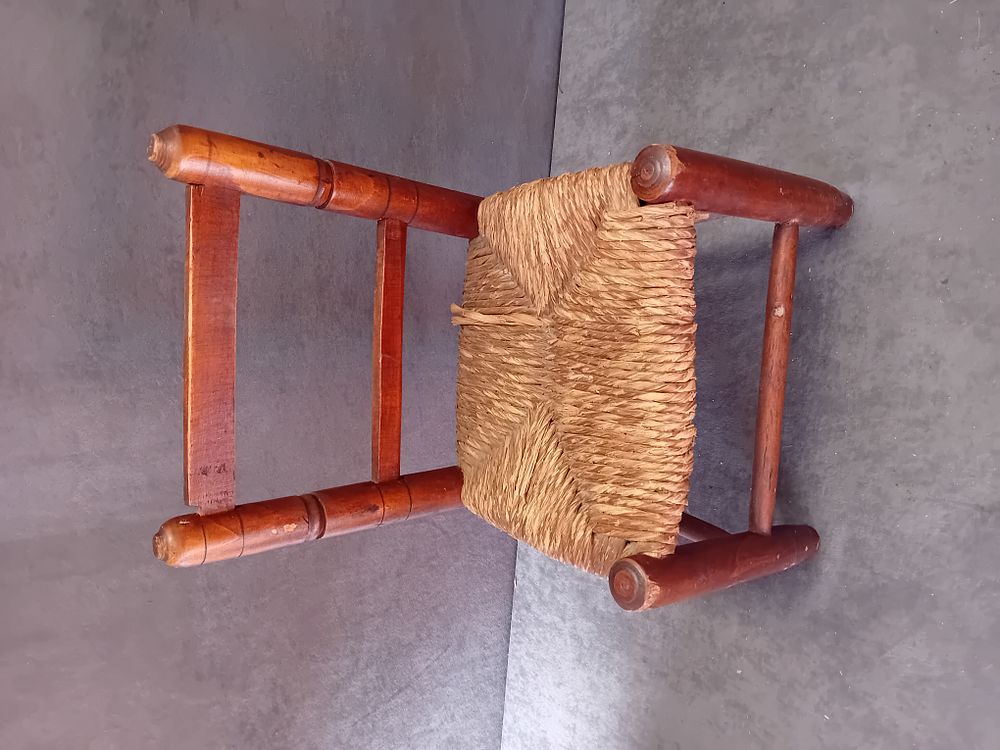 Lot 259: MEXICAN FOLK ART CHILD'S WOOD CHAIR WITH RUSH SEAT