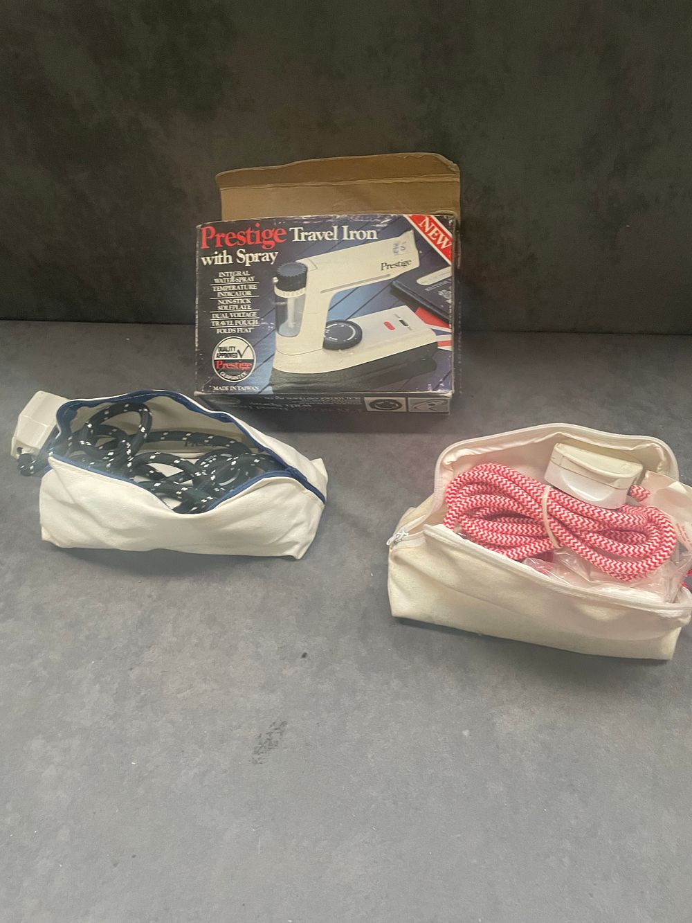 Lot 181: 2 travel irons 1 is a prestige and...