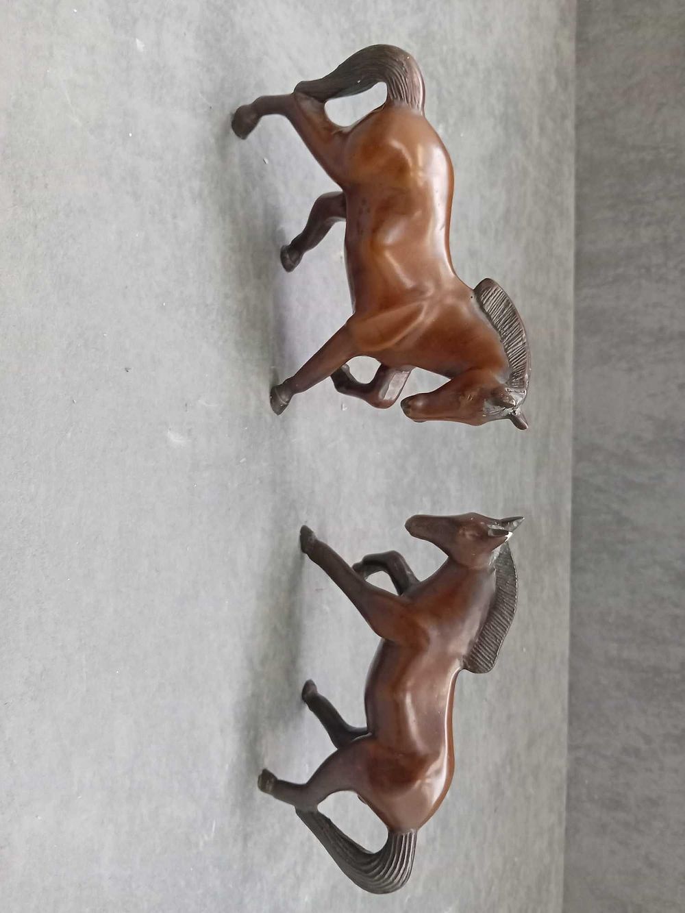 Lot 256: 2 x possibly wooden horse statuettes heavy items...