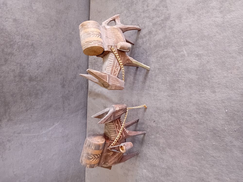 Lot 304: A Pair of Hand-Carved Wooden Folk Art Pack Donkey Figurines
