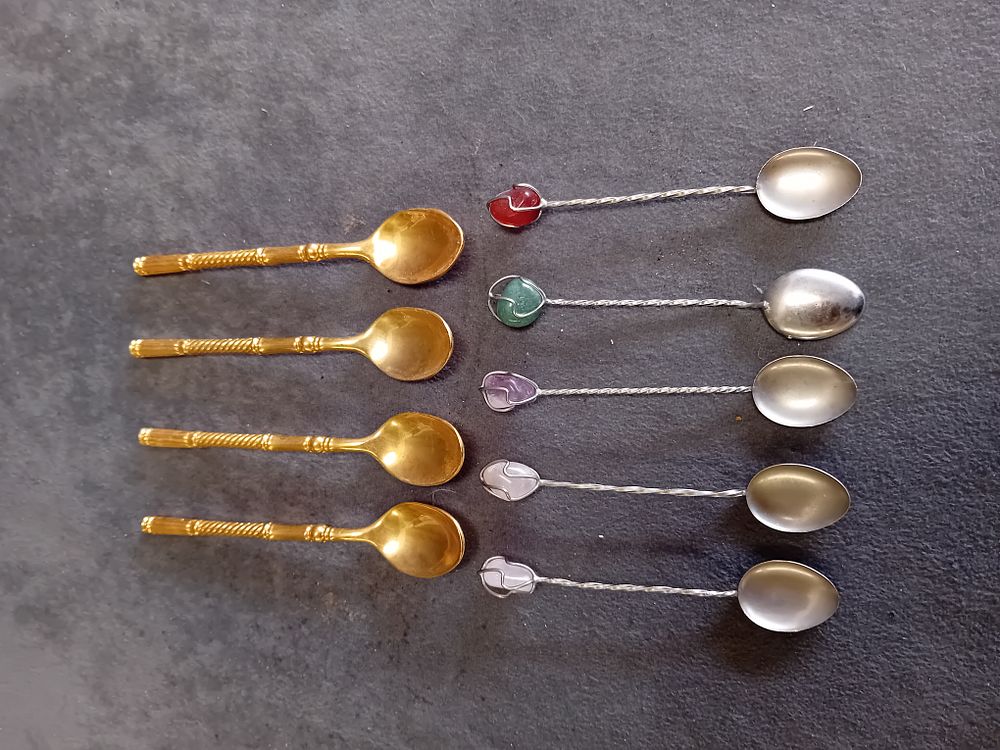 Lot 309: A Collection of Gold-Tone and Silver-Tone Demitasse Spoons with Stone Finials