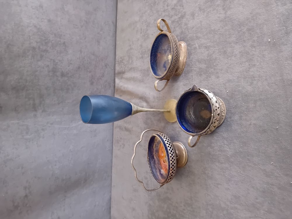 Lot 311: An Assortment of Cobalt Blue Glass and Metal Tableware