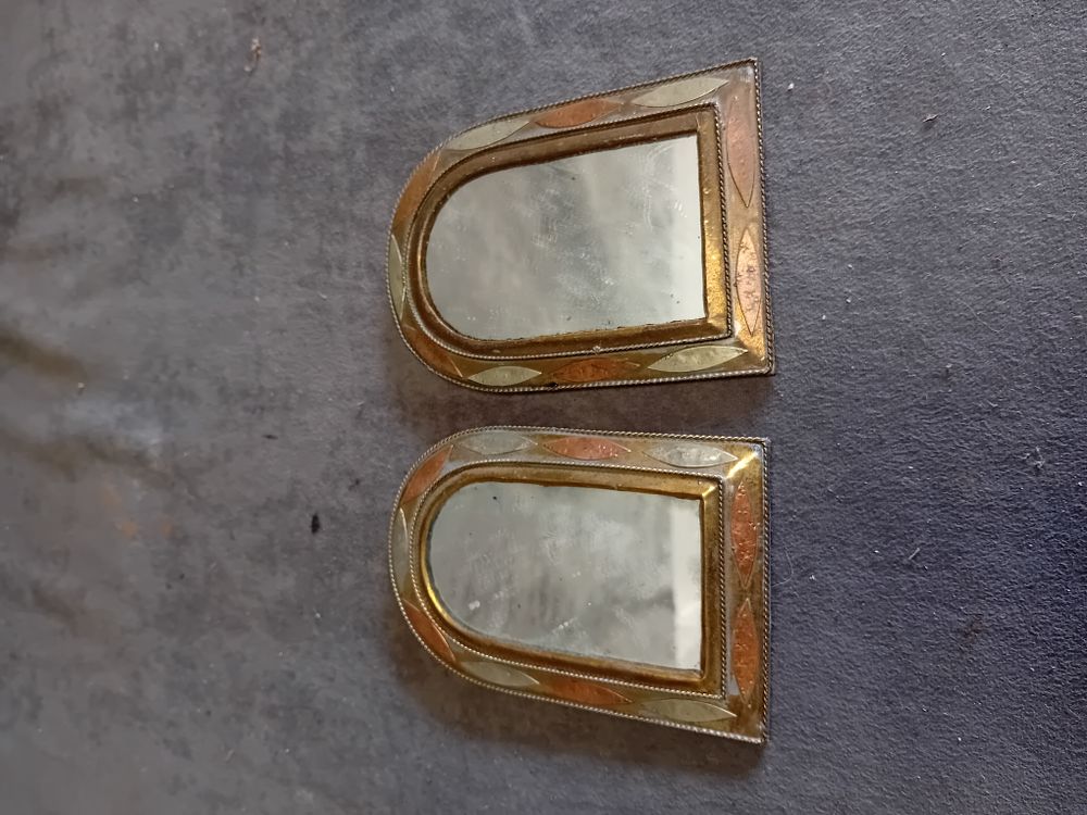 Lot 318: A Pair of Moroccan Style Mixed Metal Arched Wall Mirrors