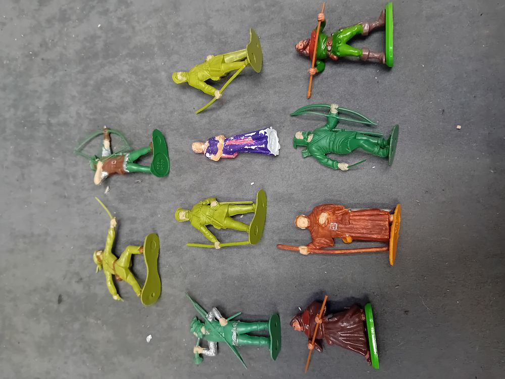 Lot 155: A Collection of 10 Vintage Robin Hood Toy Figures