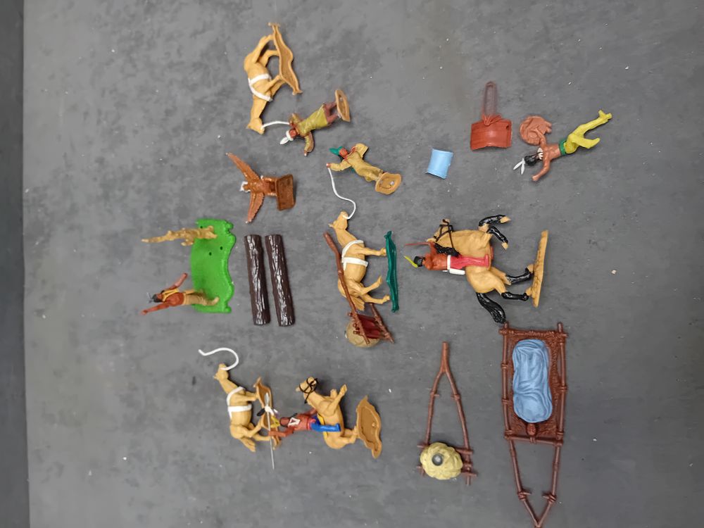 Lot 157: An Assortment of Vintage Plastic Wild West Native American Figures and Accessories