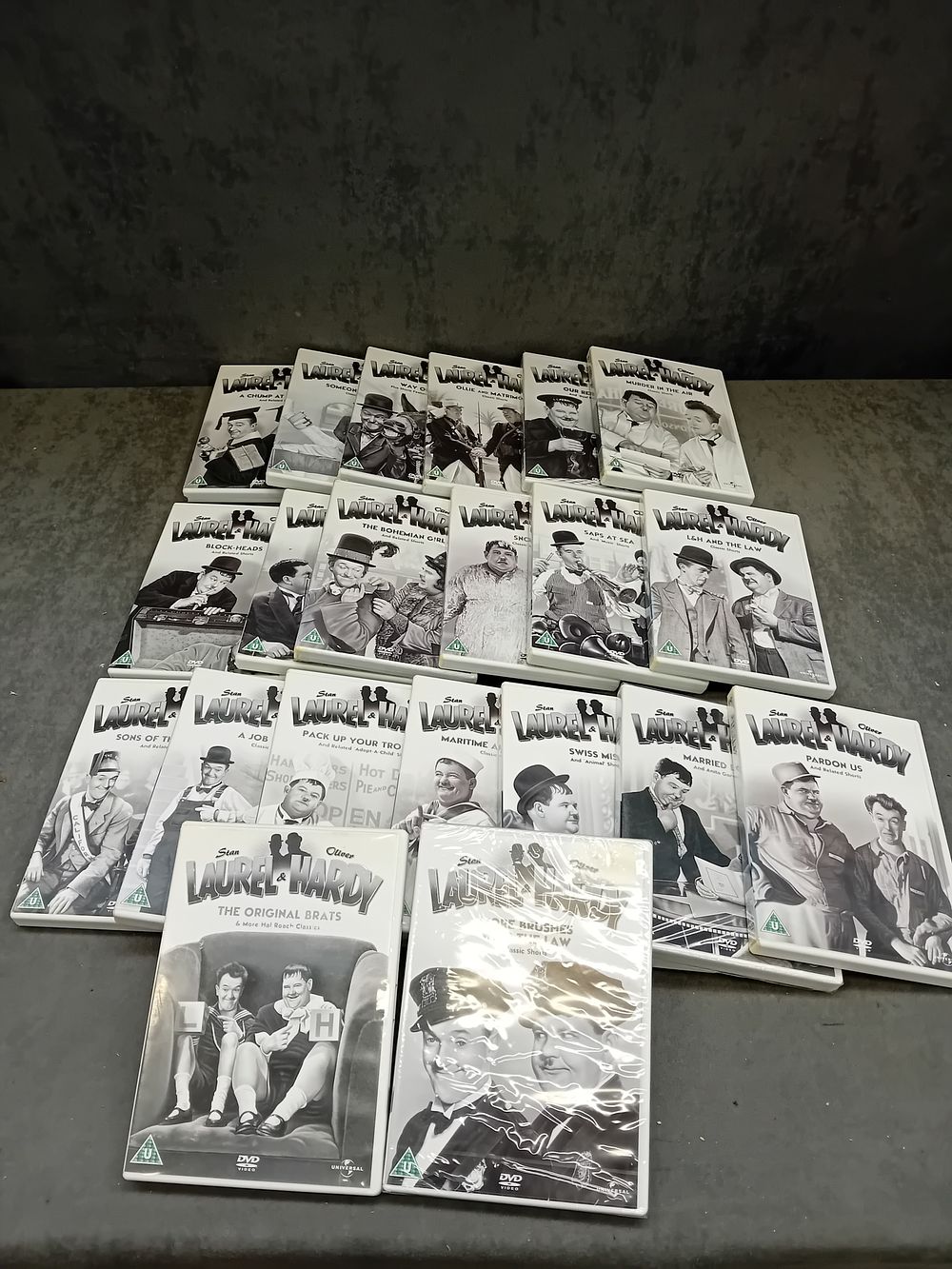 Lot 572: A Collection of 21 Laurel & Hardy DVDs