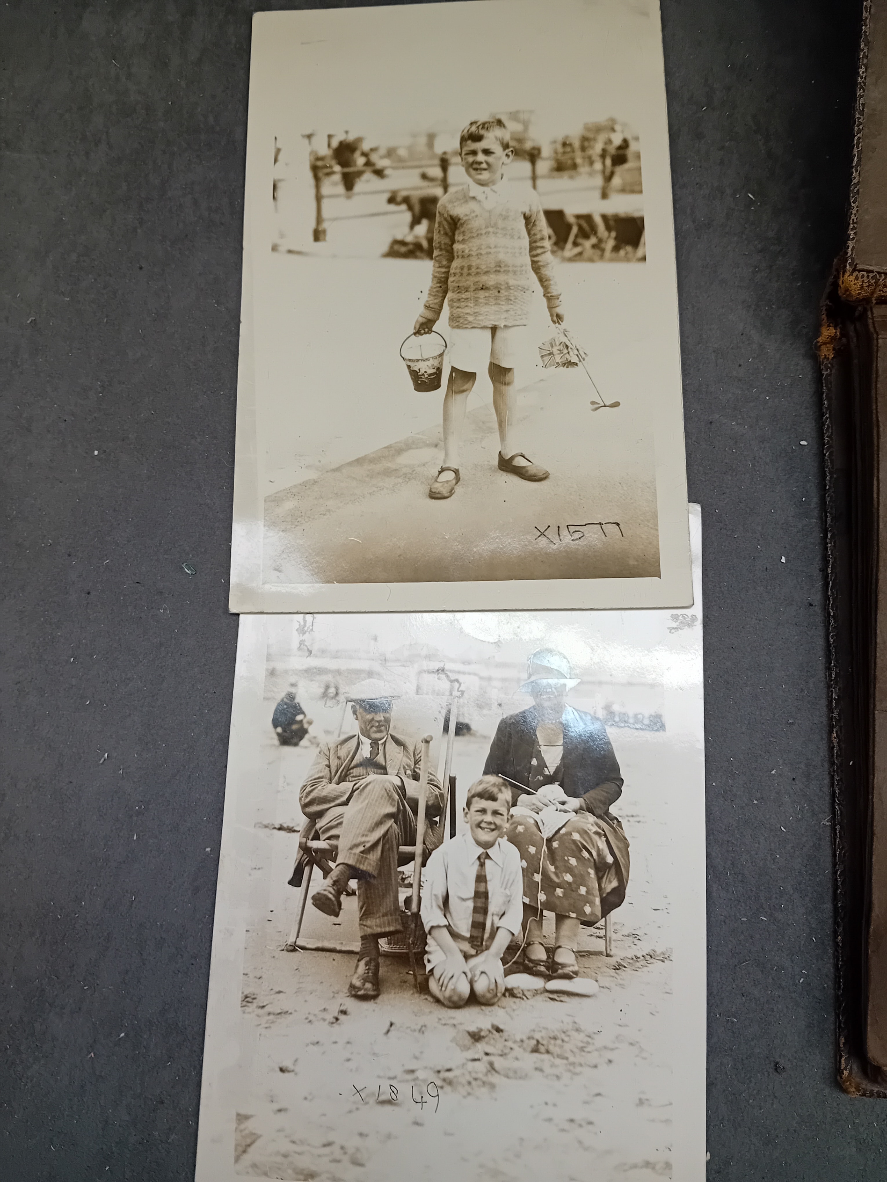 A Vintage Photo Album and Two Loose Black and White Photographs, circa 1920s-1940s