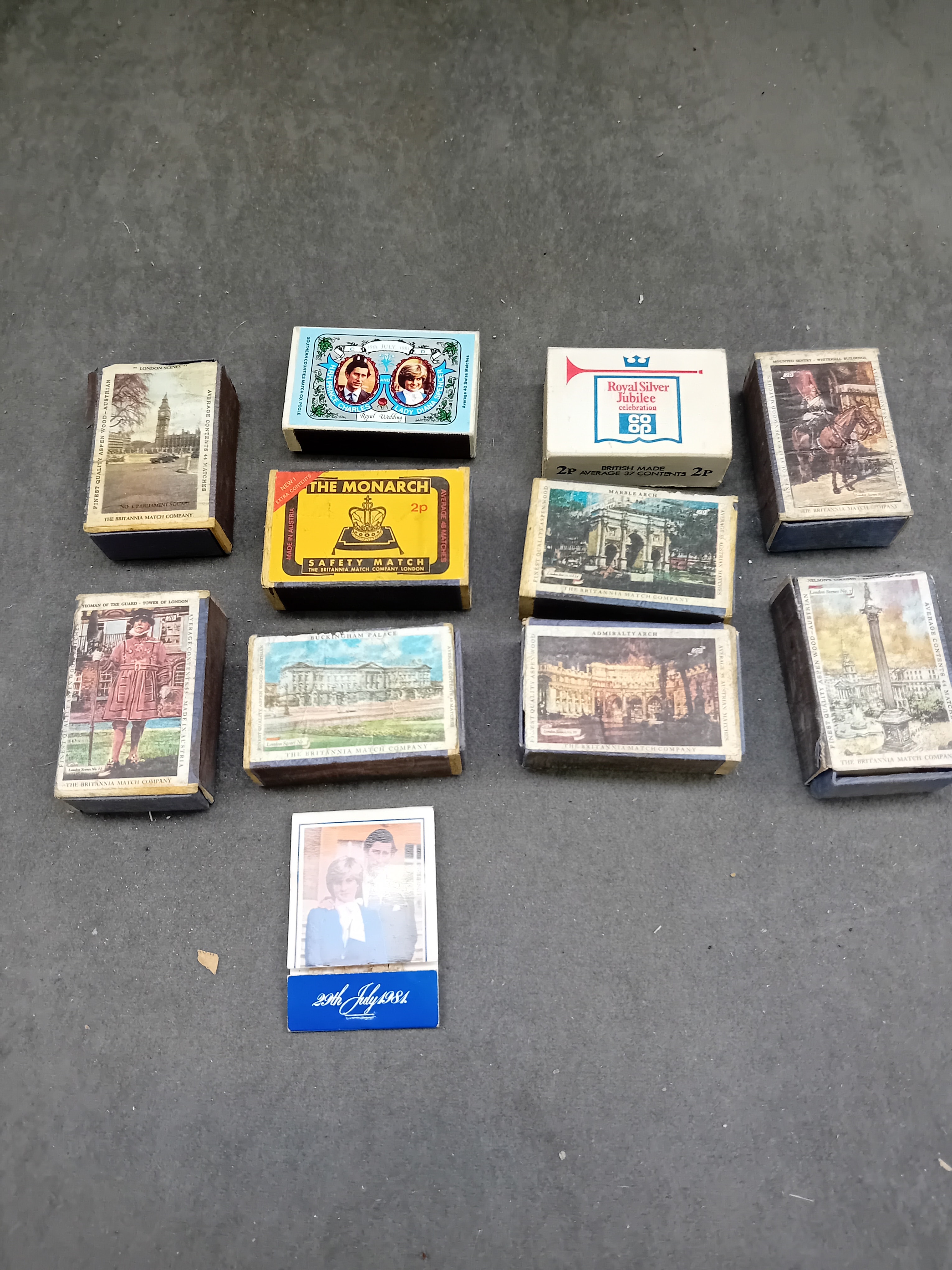 A Collection of Eleven Vintage British Matchboxes and One Commemorative Booklet, Mid-to-Late 20th Century, Royal and Landmark Themes