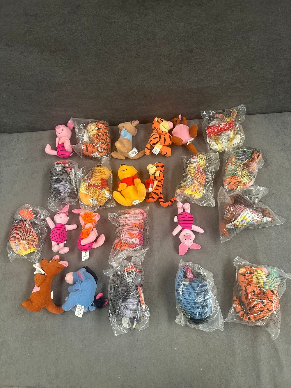 Lot 237: A Collection of 22 McDonald's Disney Winnie the Pooh Plush Toys