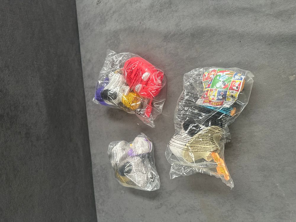 Lot 240: Three McDonald's 2023 Peanuts Snoopy Promotional Toys in Original Packaging