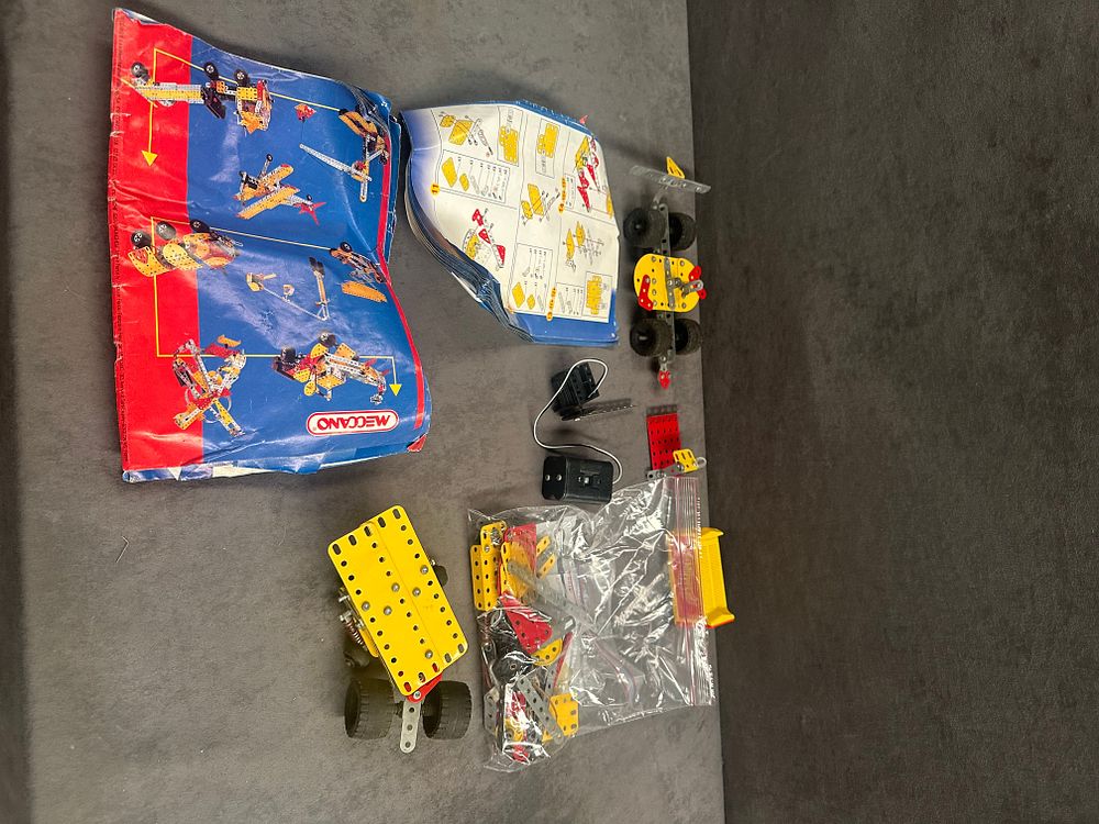 Lot 247: An Assortment of Vintage Meccano Construction Toy Parts and Accessories