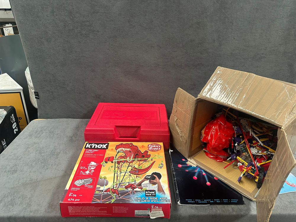 Lot 248: A Collection of K'Nex Construction Toy Sets and Loose Components including Thrill Rides T-Rex Fury