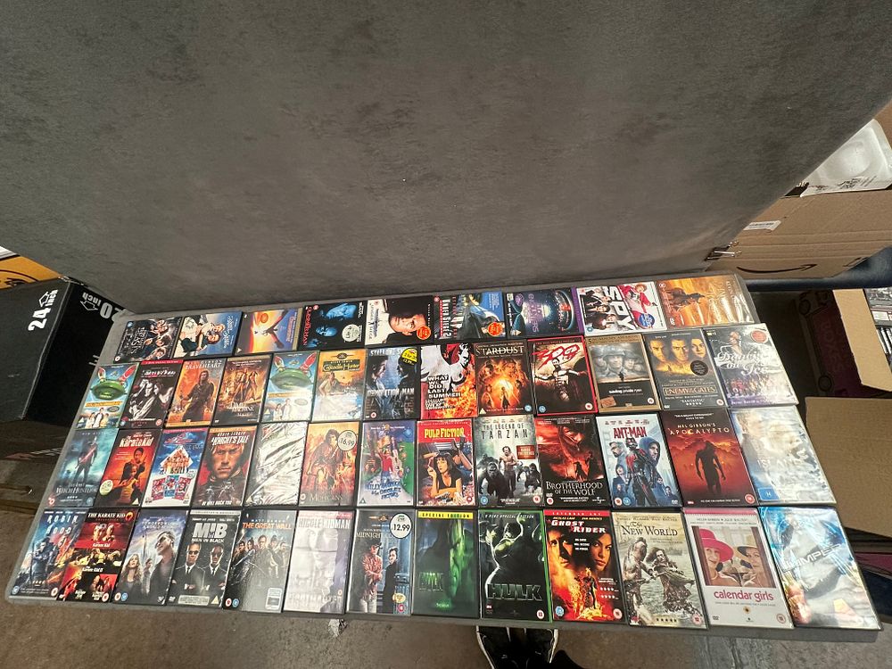 Lot 2: A Collection of Approximately 75 DVD Films Including Various Action, Science Fiction, and Drama Titles