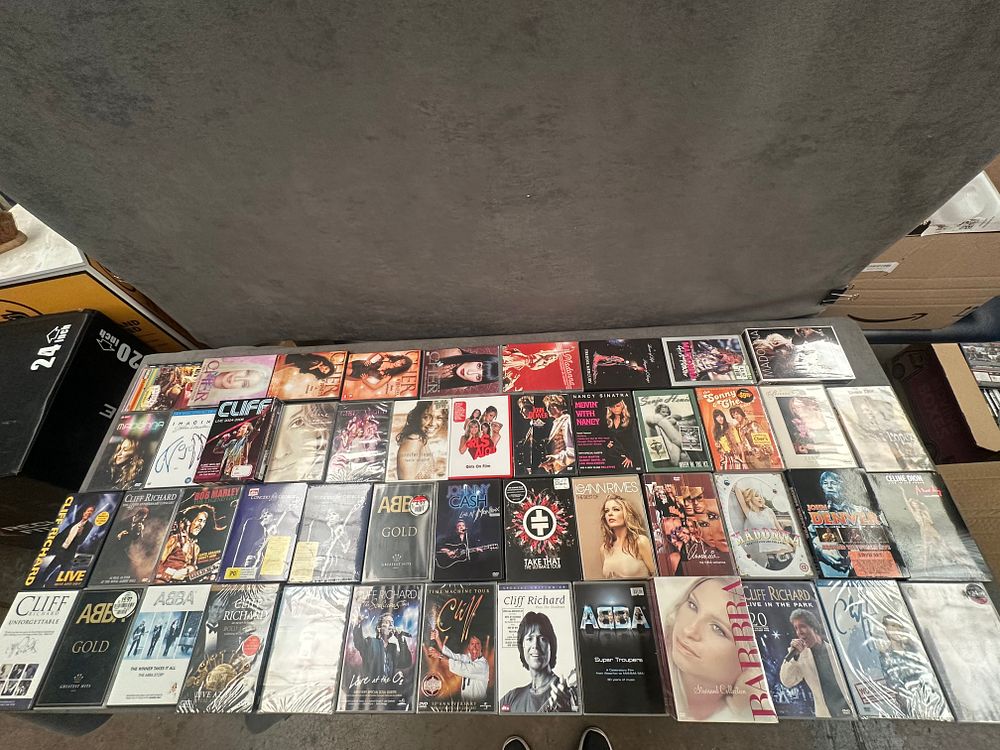 Lot 3: A Collection of Approximately 75 Music Related DVDs Including Cliff Richard and Cher