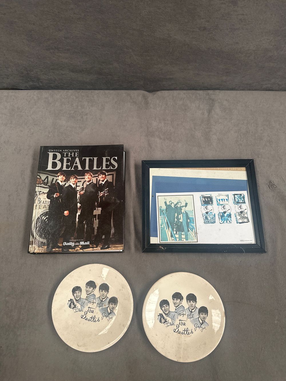 Lot 417: A Collection of The Beatles Memorabilia including Unseen Archives Book and Royal Mail Stamps