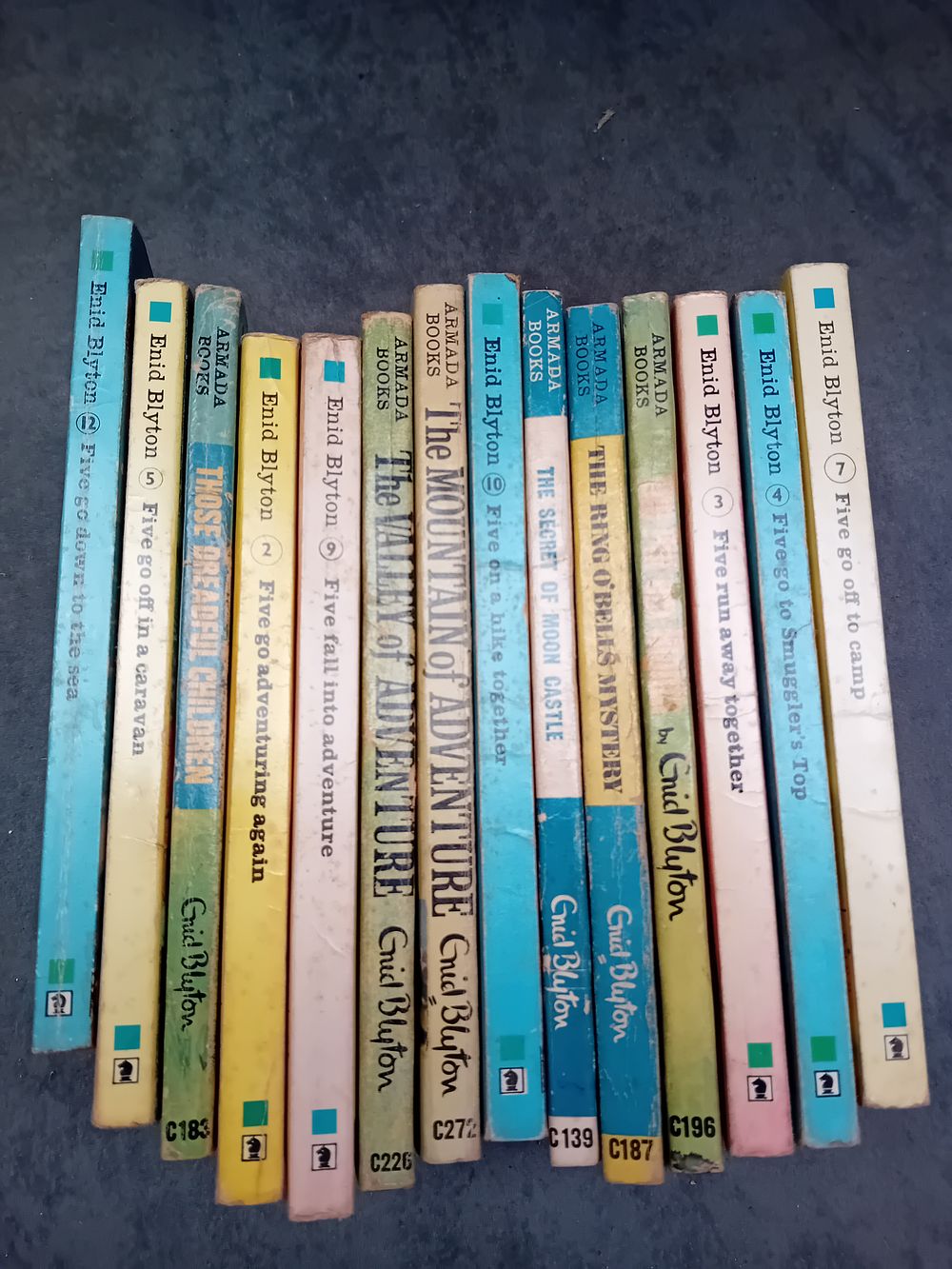 Lot 213: A Collection of 14 Enid Blyton Armada Paperback Books, Famous Five and Adventure Series