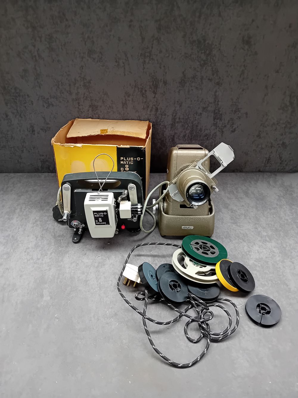 Lot 464: Aldis Anastigmat Slide Projector and Plus-O_Matic Deluxe Projector 