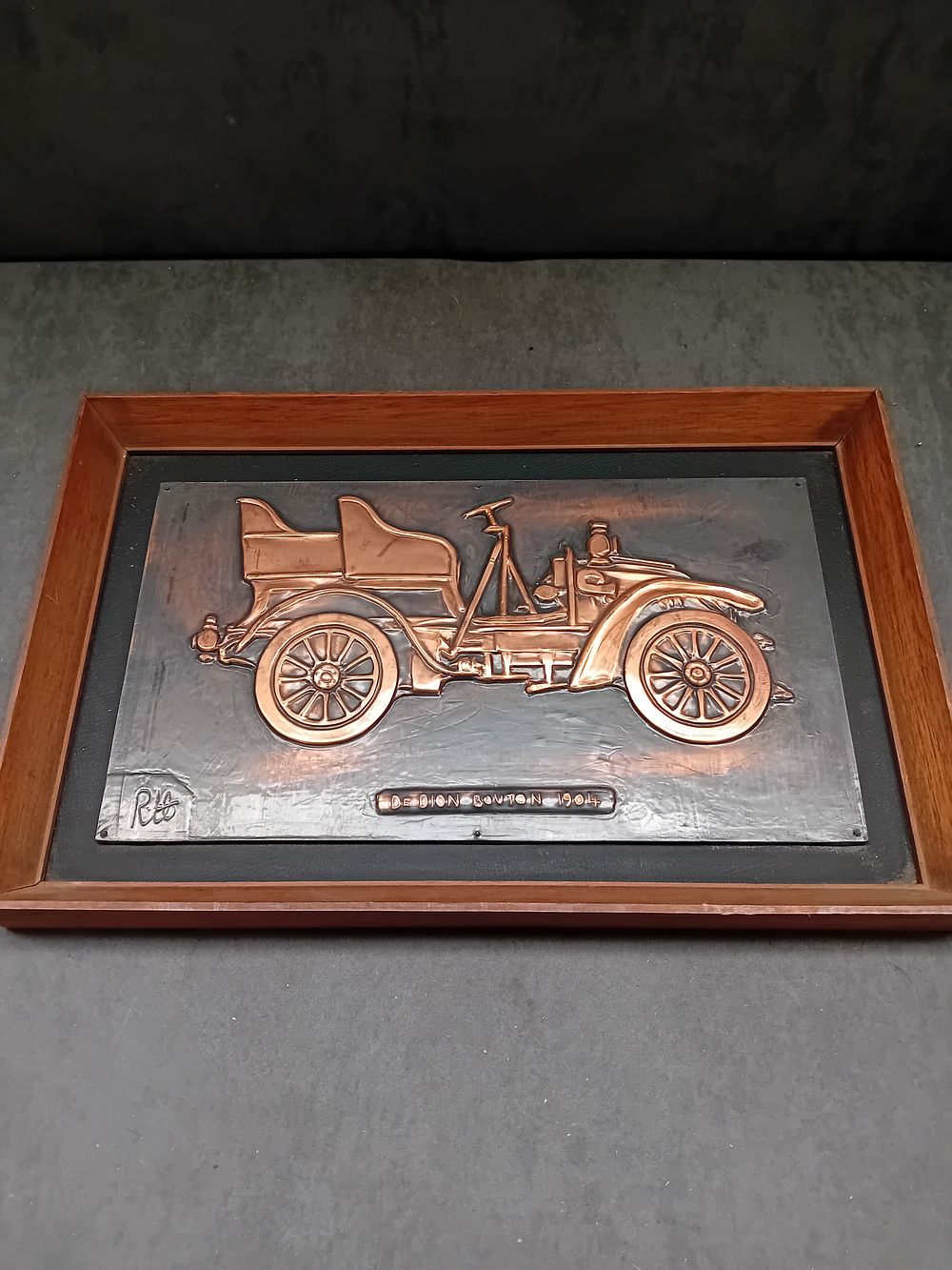 Lot 74: Framed Copper Repoussé Plaque of a De Dion Bouton 1904 Automobile by Robert Halford